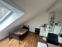 Single Bed in Dormitory Room