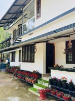 Quiet Canopy homestay - Chambres d'hôtes Padinjarathara