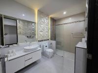 Chambre Deluxe (2 Adultes + 1 Enfant)