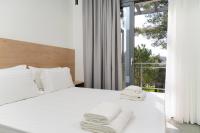 Pine Suites - Ferienwohnung Potos