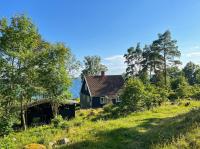 Lantligt hus med sjöutsikt och badplats - Ferienwohnung Vreta Kloster