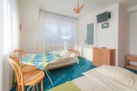 Camera Quadrupla con Vista Montagna 