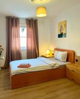 Camera Singola con Doccia e Servizi Igienici in Comune