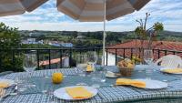 Varanda do Alqueva - Moradia T3 com Vista Panorâmica, BBQ e Praia Fluvial - Chambres d'hôtes Alqueva