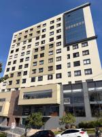 Modern studio, close to everything with garage and air conditioning - Ferienwohnung Caxias do Sul