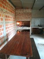 casa amplia de 3 habitaciones con quicho, patio y cochera - B&B Ranchos