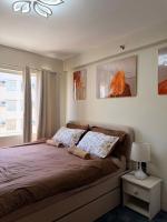 The Urban Hideout - 1 BR Cozy Studio in Marina Spatial Condo Dumaguete City - Chambres d'hôtes Piapi