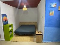 Maison troglodyte en bordure de mer - B&B Agulha