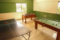 Apto novo com ampla sacada e piscinas - Ferienwohnung Guarujá