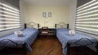 Chambre Triple avec Salle de Bains Commune