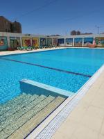 Eilat Octopus Apartment - אילת אוקטופוס -שני חדרים וסלון, בריכה בקיץ - B&B Eilat