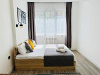 417I1 Gray and Yellow apartment Sholpan city - Chambres d'hôtes Almaty
