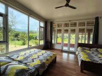 Tayra - The Glass Villa - B&B Somvārpet