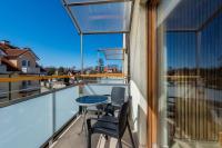 Nadmorski Apartament z Balkonem Blisko Plaży by Noclegi Renters - Chambres d'hôtes Rewal
