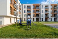 Enklawa - Apartament z Balkonem i Parkingiem Blisko Plaży i Jeziora by Noclegi Renters - Chambres d'hôtes Mielno