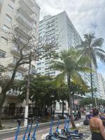 Vista para o mar Pitangueiras, pé na areia em frente o shopping Laplage - B&B Guarujá