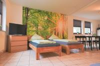 Ferienwohnung mit TV, Küche und Terasse nahe Kassel OG - Chambres d’hôtes Lohfelden