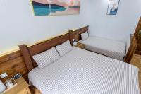 Chambre Triple – Vue sur Montagne