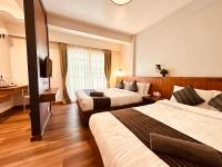 Deluxe Doppel-/Zweibettzimmer mit Balkon