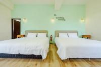 Kamer met 2 Queensize Bedden