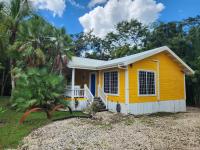 Cozy Yellow Cottage - Ferienwohnung Spanish Lookout