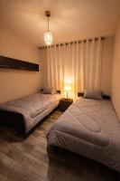 City Escape 3BR Modern Stay with Balcony - B&B Amman