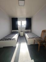 Zweibettzimmer mit Gemeinschaftsbad