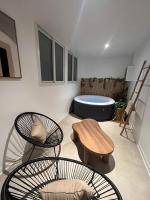 Studio Tulum - jacuzzi privé - face à la mer - Ferienwohnung Tartane