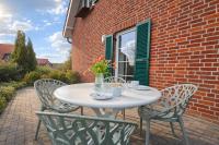 Ferienhaus Sandregenpfeifer mit Kamin, großem Garten & nahe Ostsee - Chambres d’hôtes Dassow