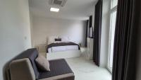 Monolocale con Divano-Letto