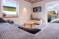 Haus Sonnengelb - Ferienwohnung Taarstedt
