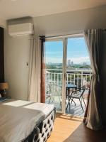 Studio unit with balcony - Mesatierra Garden Residences - Chambres d’hôtes Davao