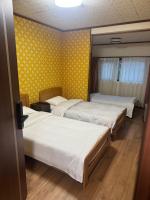 Camera Tripla Basic con Bagno in Comune