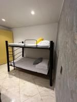 Chambre Quadruple avec Salle de Bains Commune