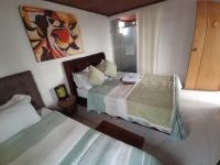 Chambre Triple avec Salle de Bains Privative