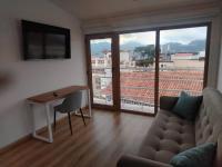 One-Bedroom Apartment with Balcony and City View