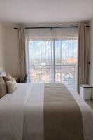 Elegant Cozy Haven with a Rooftop Pool - B&B Nairobi