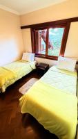 Espaçoso Apto triplo a 300 mts do Centrinho Capivari - B&B Campos do Jordão