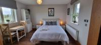 Kamer met Kingsize Bed en Uitzicht op de Tuin