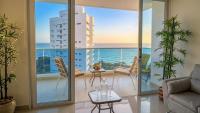 Apartamento con vista directa al mar en Reserva del Mar - Balcón, playa privada y piscinas tipo resort - Chambres d'hôtes Santa Marta
