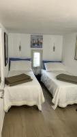 Kleine Tweepersoonskamer met 2 Aparte Bedden