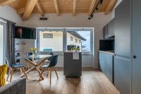 Alpine Lodge Grey by Tss - The charm of the center - B&B Levico Terme