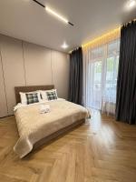 Комфортные апартаменты в престижной локации - Chambres d'hôtes Almaty