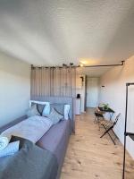 Modernes Studio am See mit Aussicht auf Eiger Mönch Jungfrau - Ferienwohnung Einigen