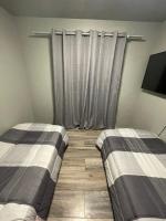 Tweepersoonskamer met 2 Aparte Bedden