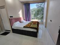 Doppel-/Zweibettzimmer mit Stadtblick