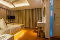 Kamer met Queensize Bed en Uitzicht op Zee