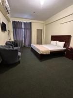 Habitación Doble con balcón (2 adultos + 1 niño)