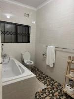 Ekhaya Loft - Chambres d'hôtes Mbabane