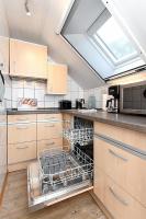 Fewo Mohnblume, Familienfreundliche Wohnung mit Außenspielanlage im Grünen - Chambres d'hôtes Utarp
